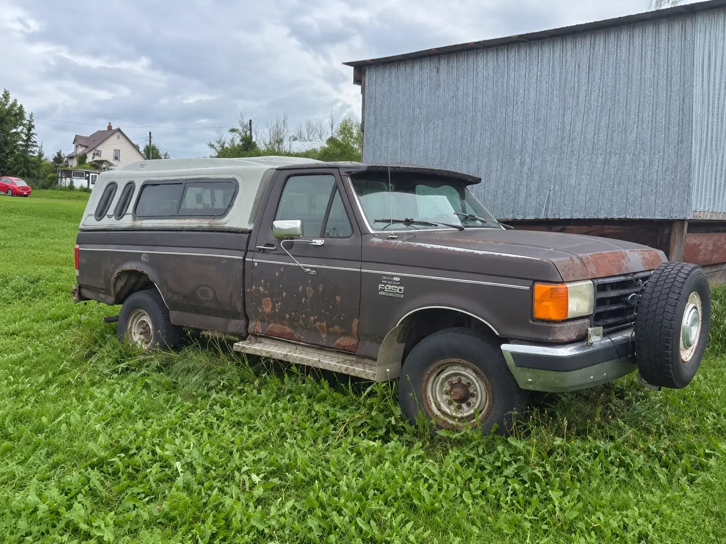Work truck with scratched bed and gear in the Box