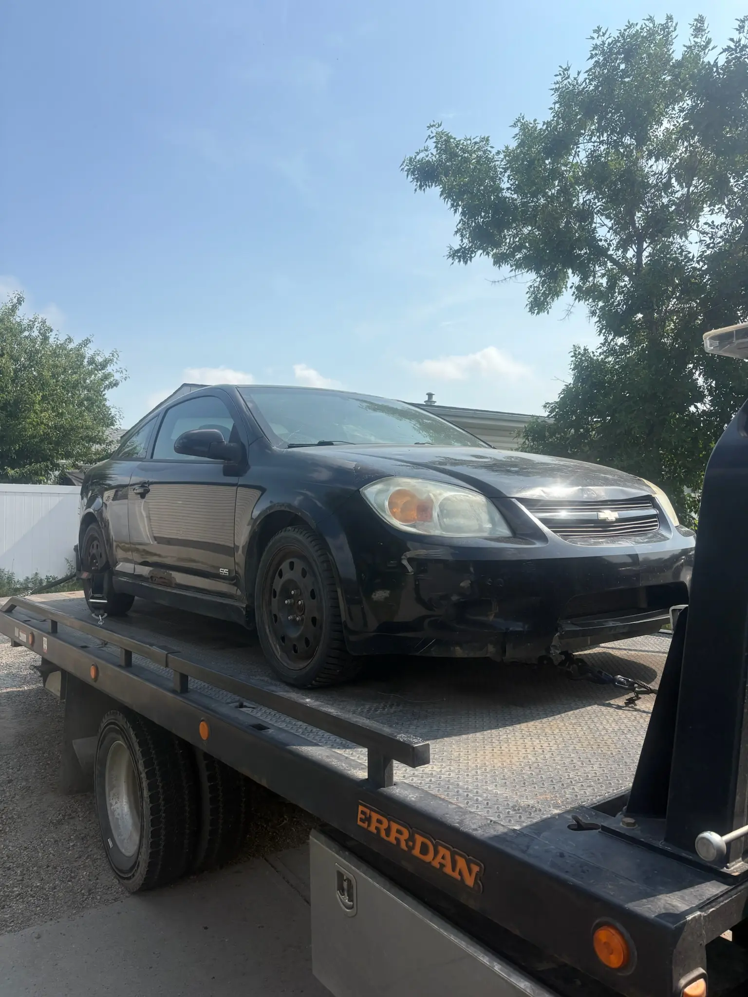 Tow truck arriving for same day vehicle removal in Banff